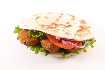 falafel and vegetables in pita bread
