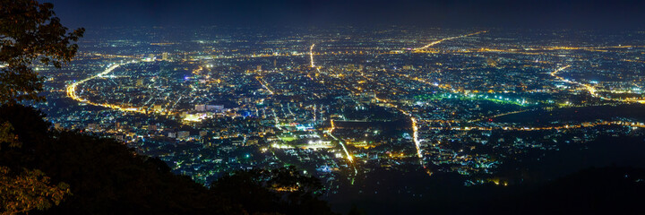 Chiang Mai city cityscape aerial view skyline during night with illuminated light, panorama.