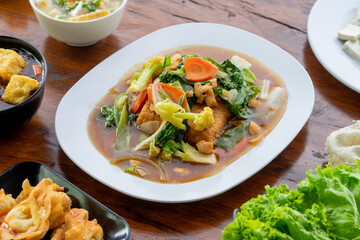 Indonesian specialities made from tofu are served on the table.