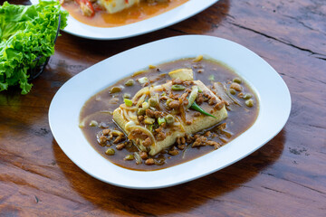 Indonesian specialities made from tofu are served on the table.