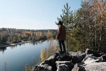 person on a rock