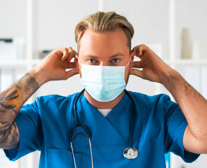 Professional medical doctor in hospital office, Portrait of young and confident physician in protective mask.