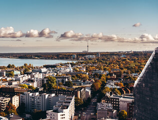 Fall view over the city of Tallinn with tall buildings and colorfull trees, Estonia - 434955366