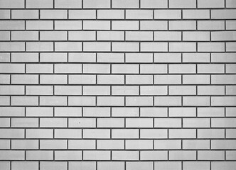Light gray brick wall. Abstract background for design. Backdrop for displaying text.