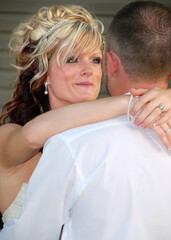 emotional bride and groom dancing showing bride's face closeup