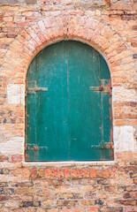 old brick wall with door