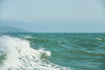 Texture of white wave in the ocean.