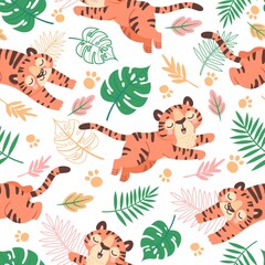 Baby tiger seamless pattern. Cute childish cartoon tigers, paw prints and tropical leaves. Jungle animal, wild cats, kids vector wallpaper © Tartila