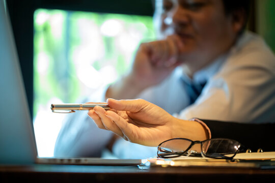 Businesses are offering alternative information to help decision makers in marketing planning. Diverse business team discuss statistical report infographics, charts share