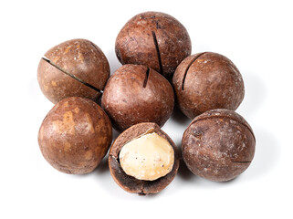 handful of macadamia nuts closeup on white