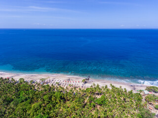 An aerial view on White Sand Beach or Virgin Beach on Bali island in Indonesia.