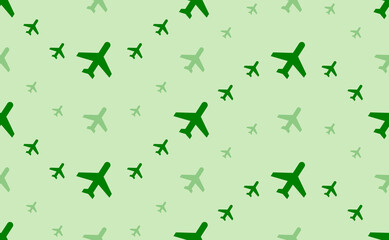 Seamless pattern of large and small green plane symbols. The elements are arranged in a wavy. Vector illustration on light green background