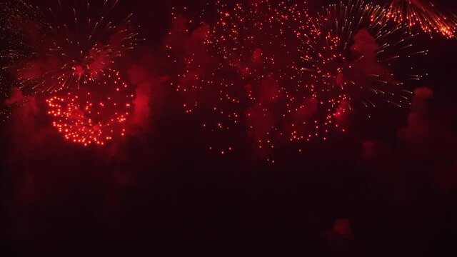 Festive fireworks in night sky of big city