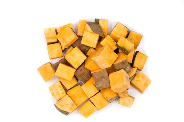 Sweet potato cubes isolated on white background top view