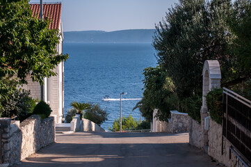 street in the city with sea view