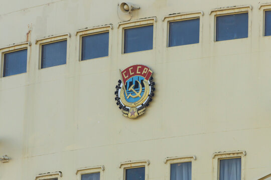St.Petersburg, Russia - August, 09, 2020: Coat of arms of the Soviet Union on the Soviet icebreaker-museum "Krasin" in St. Petersburg.