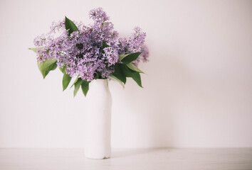 Vintage still life of lilac flowers, Springtime. Gentle floral muted garden flowers