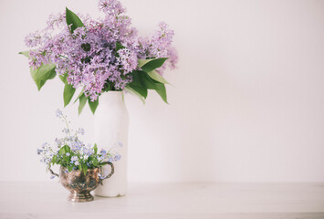 Vintage still life of lilac and forget-me-nots  flowers, Springtime