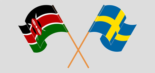 Crossed and waving flags of Kenya and Sweden