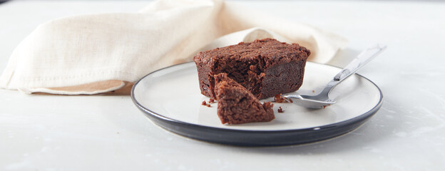 Chocolate brownies dessert on plate with napkin. Bakery, confectionery concept