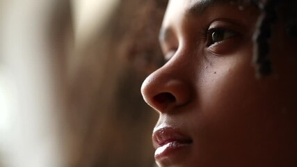 Contemplative little girl face, thoughtful child
