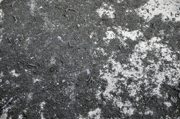Remains of rubbed rubber on the asphalt of the race track. Drift. Background.