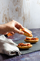 Grabbing a toast with sobrasada and cheese