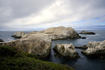 Fototapeta na wymiar Point Lobos - Cormorant flock on rocks out to Sea
