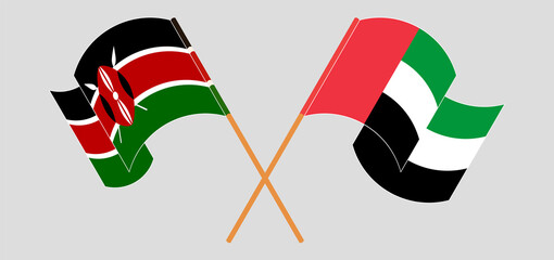 Crossed and waving flags of Kenya and the United Arab Emirates