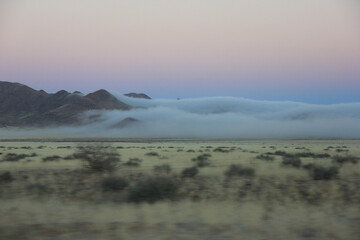 Early morning fog at sossusvlei in the dunes of Namibia, Africa