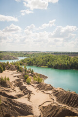 Russia, Tver region, konduki blue river, green forest, blue sky
