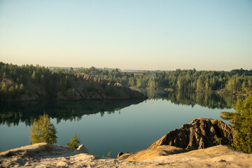 Russia, Tver region, konduki blue river, green forest, blue sky