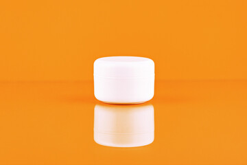 Unbranded plastic jar for cosmetics products. Skincare and cosmetology mockup. Branding identity mockup concept