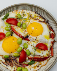 delicious breakfast on a plate on a white background