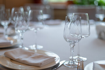 Decorated wedding table. Wedding table. Close-up of wine glass