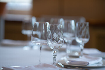Decorated wedding table. Wedding table. Close-up of wine glass