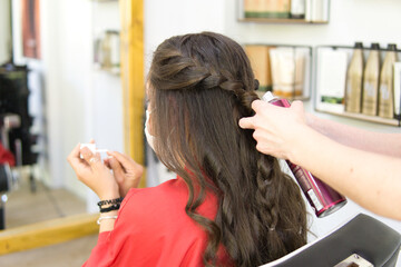 Naklejka premium Woman at the hairdresser's