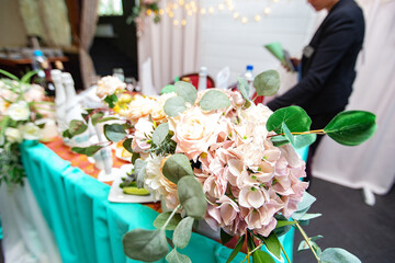 beautiful designer wedding bouquet. colorful fresh flowers are combined with each other. wedding ceremony decoration for lovers
