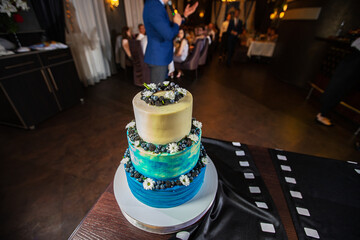 beautiful handmade wedding cake. sweet treats in the restaurant for the guests of the newlyweds. completion of the wedding ceremony. biscuit delicacy