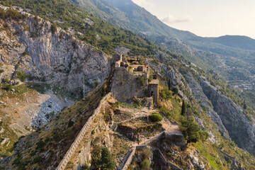 Fototapeta na wymiar Fortress of St. John in Kotor. Montenegro. Powerful zigzag wall