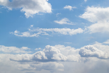 Blue sky with beautiful cumulus clouds, background