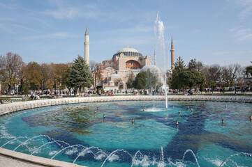 Hagia Sophia with fountain by day. Religious landmark in the heart of Istanbul - Turkey. Unesco World Heritage Site in Europe