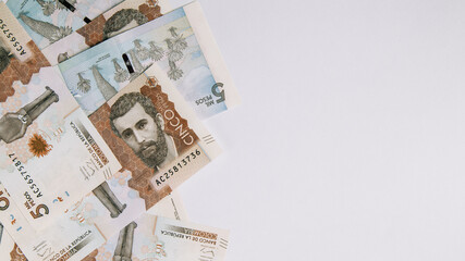 Fototapeta na wymiar colombian money, five thousand pesos on white background