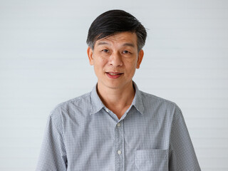 Portrait of warm personality senior older Asian man in casual dress friendly pose and looking to...