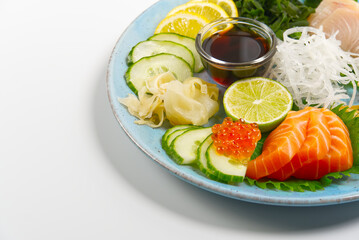sashimi set, Japanese food. sushi restoran menu. Japanese seafood. sashimi set on plate with cucumber and salad. Takea way sashimi set.