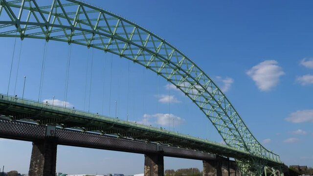 Silver Jubilee Bridge steel arch panning shot from Widnes to Runcorn.
