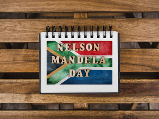Beautiful postcard with a picture of the flag of South Africa. Closeup, view from above. National...