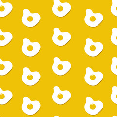 Seamless pattern with scrambled eggs on orange background. Vector illustration