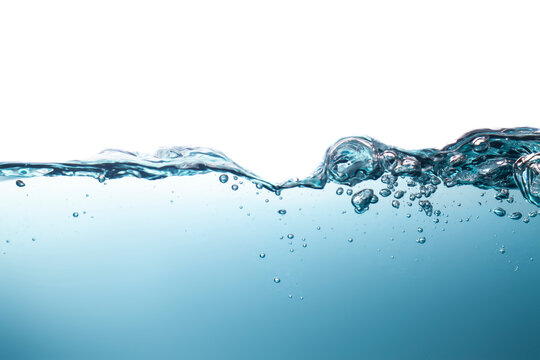 Beautiful water waves splashing water waves in clear blue water, creating beautiful bubbles.