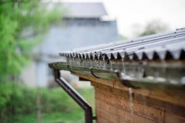 Rainwater drains off the roof.